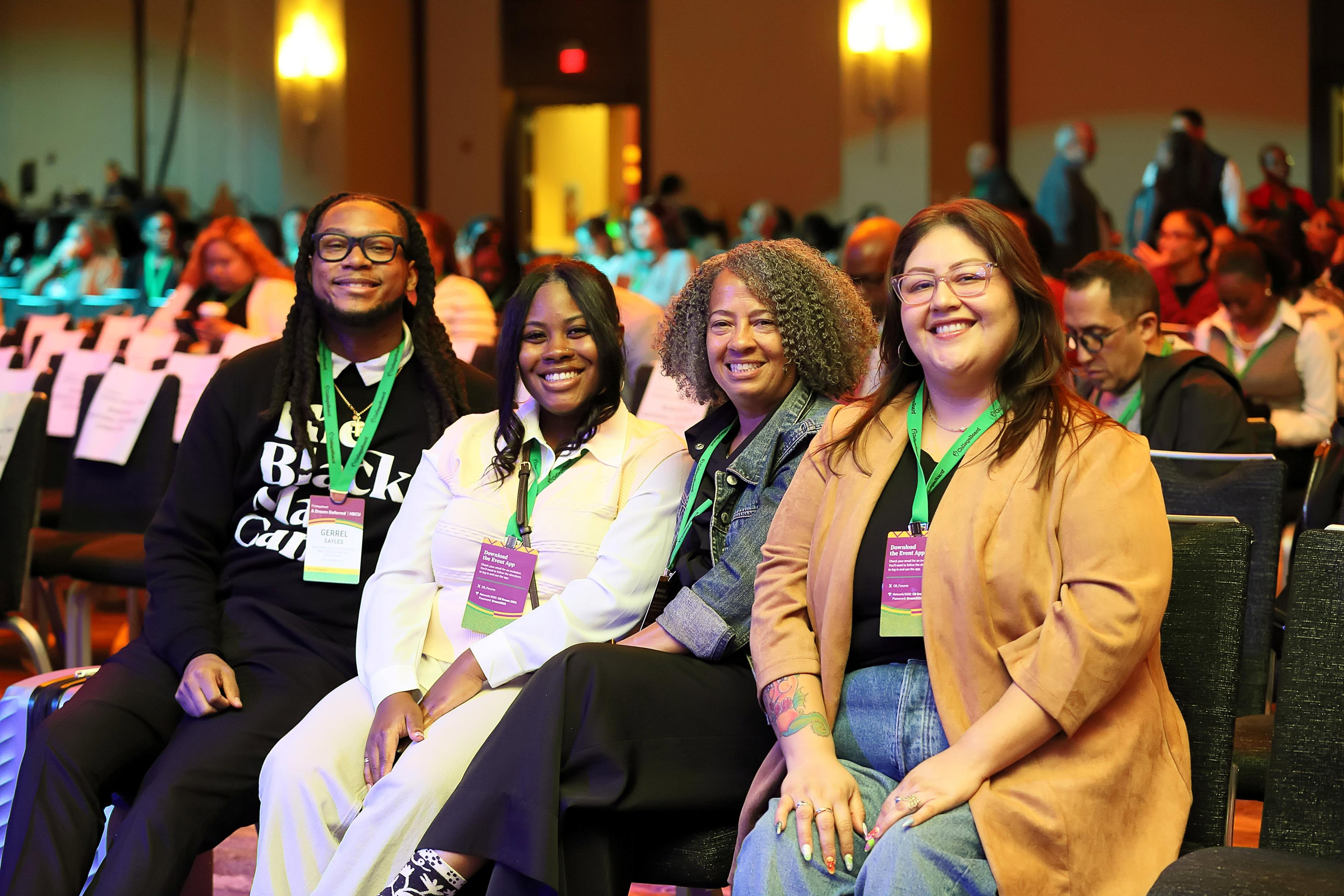 Attendees posing for a photo before the main stage session.